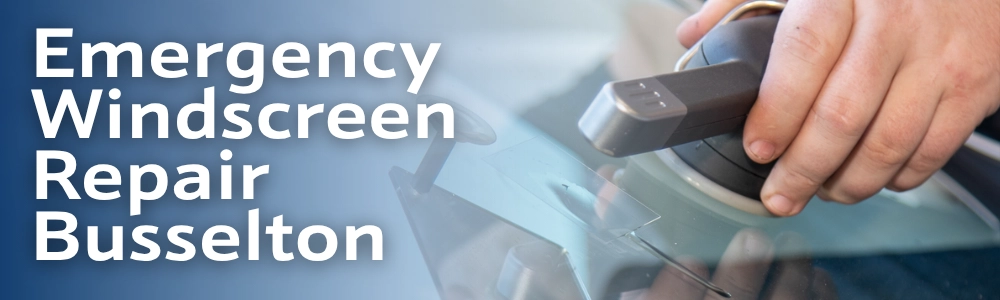 Banner image for South West Windscreens & Tint with bold white text overlay reading 'Emergency Windscreen Repair Busselton' alongside a close-up of a technician's hand holding a professional resin injection tool against a vehicle windscreen.